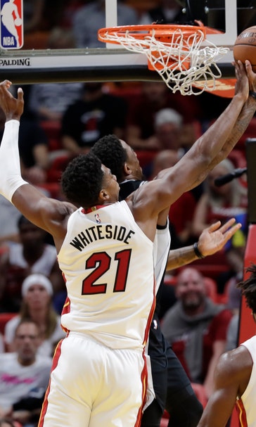 Whiteside dominates, Heat top Spurs 95-88